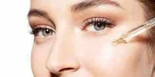 Applying serum with hyaluronic acid for wrinkles to enhance skin hydration and reduce fine lines